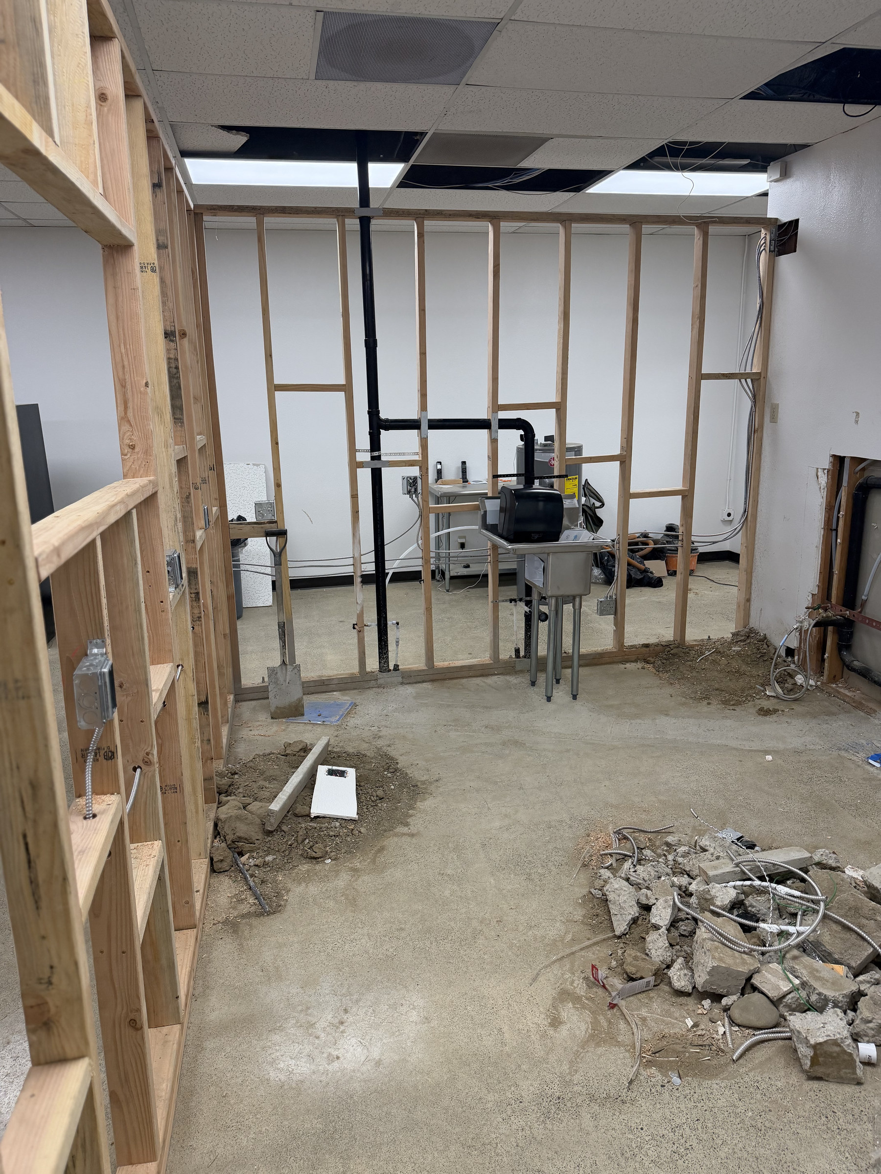 Newly framed interior partitions help define the commercial kitchen and service areas.